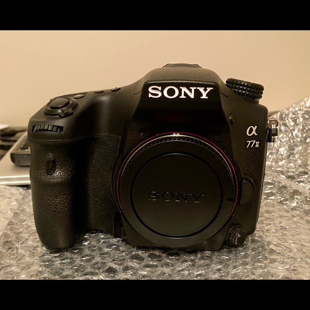 Sony a77ll 24.4 mp DSLR w/ many accessories.